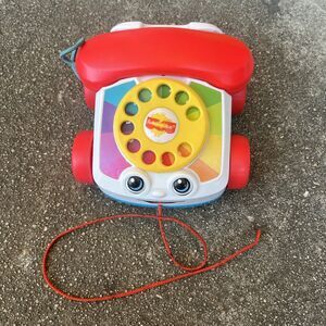 Fisher-Price Chatter Phone Pull Toy for Toddlers Ages 1+ Pretend Play